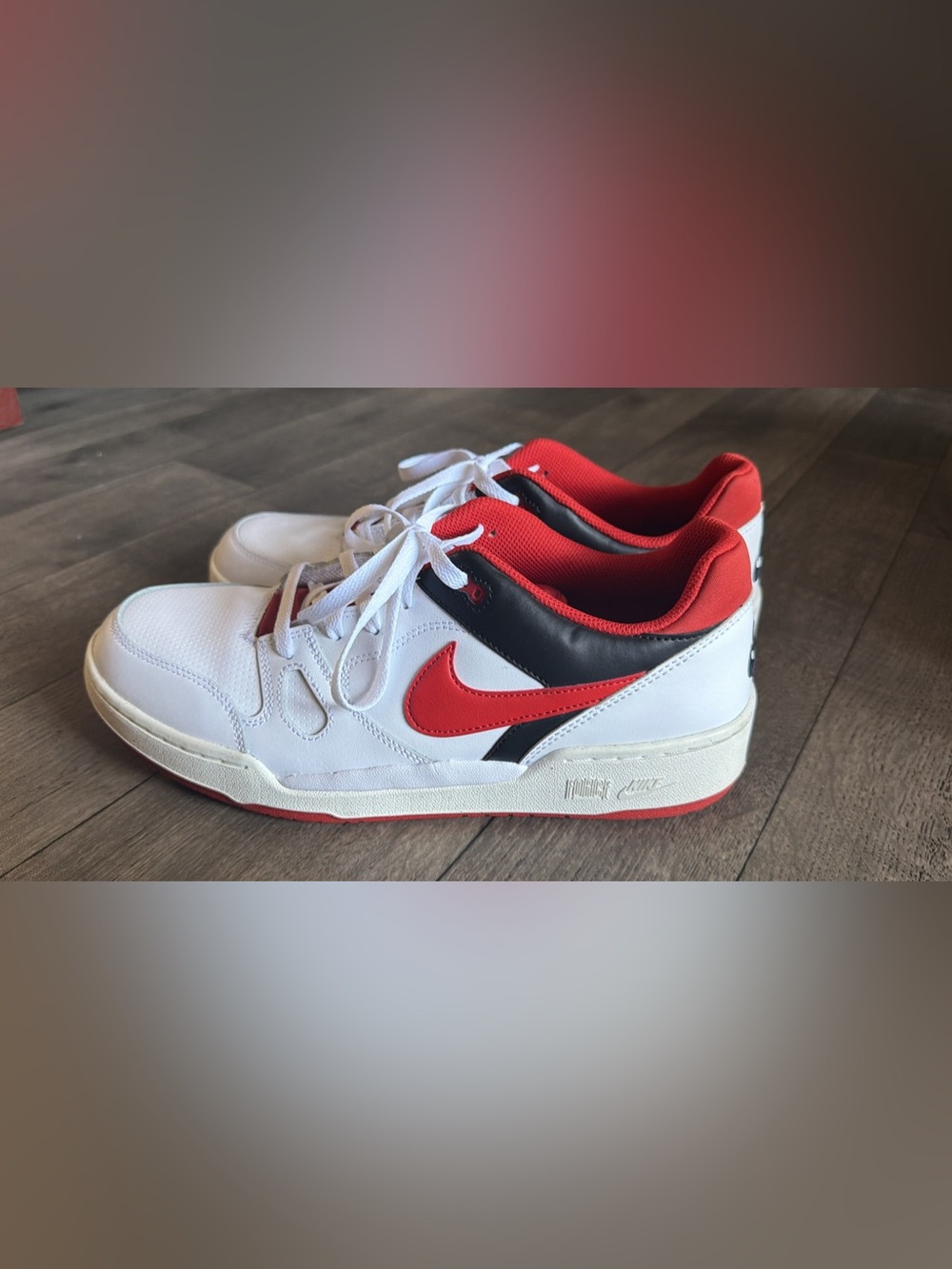 Nike White Sneakers with Red Swoosh and Black Collar